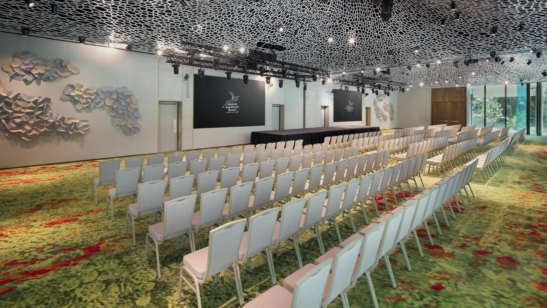 Our magnificent pillar-less ballroom, boasting a 4-meter-high ceiling, accommodates up to 300 guests and can be divided into two distinct function rooms, each outfitted with permanent LED screens. 